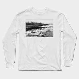 Rough waves hit the rocks near Dunstanburgh castle in Northumberland, UK Long Sleeve T-Shirt